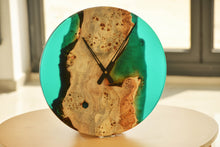 Load image into Gallery viewer, Poplar mappa burl timber 40cm daiameter wall hanging clock with transparent turquoise blue resin.