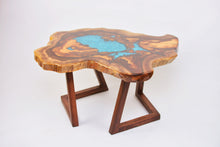 Load image into Gallery viewer, Round sliced walnut resin coffee table with unique cracks and holes inlays in turquoise colour