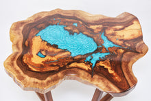 Load image into Gallery viewer, Round sliced walnut resin coffee table with unique cracks and holes inlays in turquoise colour