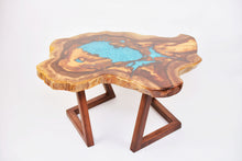 Load image into Gallery viewer, Round sliced walnut resin coffee table with unique cracks and holes inlays in turquoise colour