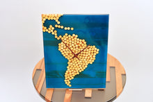 Load image into Gallery viewer, Ocean blue epoxy resin with wood balls, south american map wall clock