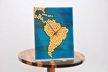 Load image into Gallery viewer, Ocean blue epoxy resin with wood balls, south american map wall clock