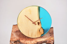 Load image into Gallery viewer, Sky blue transparent epoxy resin with oak hanging wall clock, 30 cm diameter.