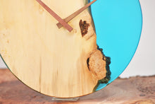 Load image into Gallery viewer, Sky blue transparent epoxy resin with oak hanging wall clock, 30 cm diameter.