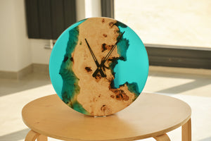 Poplar mappa burl timber 40cm daiameter wall hanging clock with transparent turquoise resin.