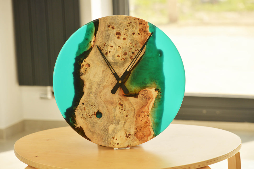 Poplar mappa burl timber 40cm daiameter wall hanging clock with transparent turquoise blue resin.