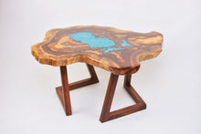 Load image into Gallery viewer, Round sliced walnut resin coffee table with unique cracks and holes inlays in turquoise colour
