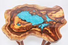 Load image into Gallery viewer, Round sliced walnut resin coffee table with unique cracks and holes inlays in turquoise colour

