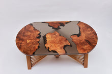 Load image into Gallery viewer, Burl Scottish Elm oval black transparent epoxy resin coffee table with creative DNA Oak wood legs.
