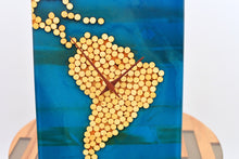 Load image into Gallery viewer, Ocean blue epoxy resin with wood balls, south american map wall clock
